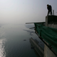 A worker along the Danjiangkou Reservoir.